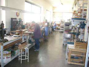 Brandoni craftsmen hard at work in the factorys expansive manufacturing area. 